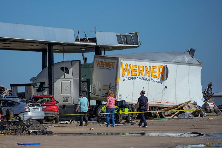 Damage is seen at a truck stop the morning after a tornado rolled through, Sunday, May 26, 2024, in Valley View, Texas. Powerful storms killed multiple people and left a wide trail of destruction Sunday across Texas, Oklahoma and Arkansas after obliterating homes and destroying a truck stop where drivers took shelter during the latest deadly weather to strike the central U.S. (AP Photo/Julio Cortez)