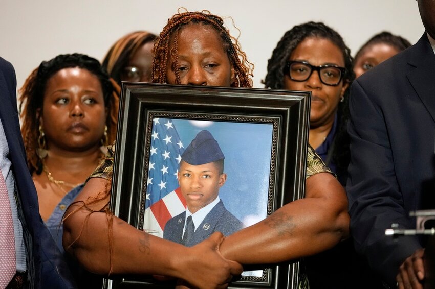 Chantemekki Fortson, mother of U.S. Air Force senior airman Roger Fortson, holds a photo of her son during a news conference May 9, 2024, in Fort Walton Beach, Fla. (AP Photo/Gerald Herbert, file)
