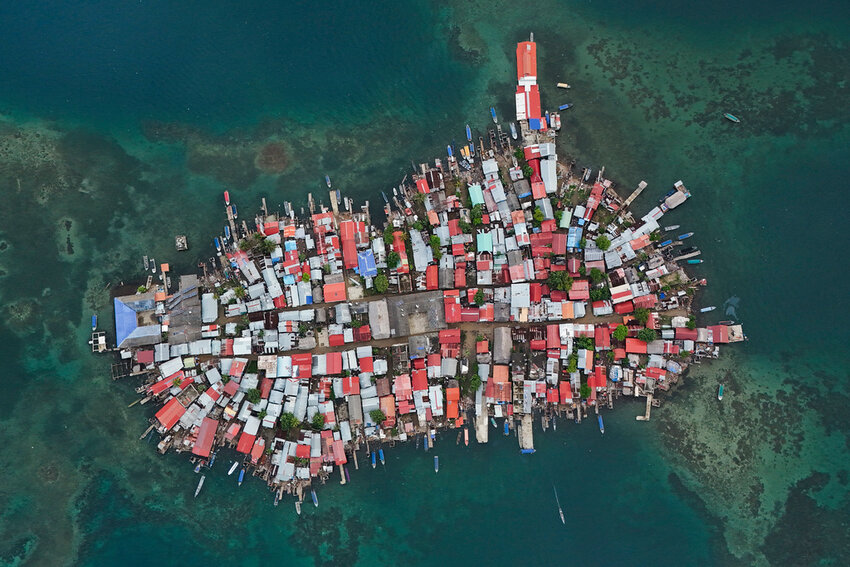 Buildings cover Gardi Sugdub Island, part of San Blas archipelago off Panama's Caribbean coast, Saturday, May 25, 2024. Due to rising sea levels, about 300 Guna Indigenous families will relocate to new homes, built by the government, on the mainland. (AP Photo/Matias Delacroix)
