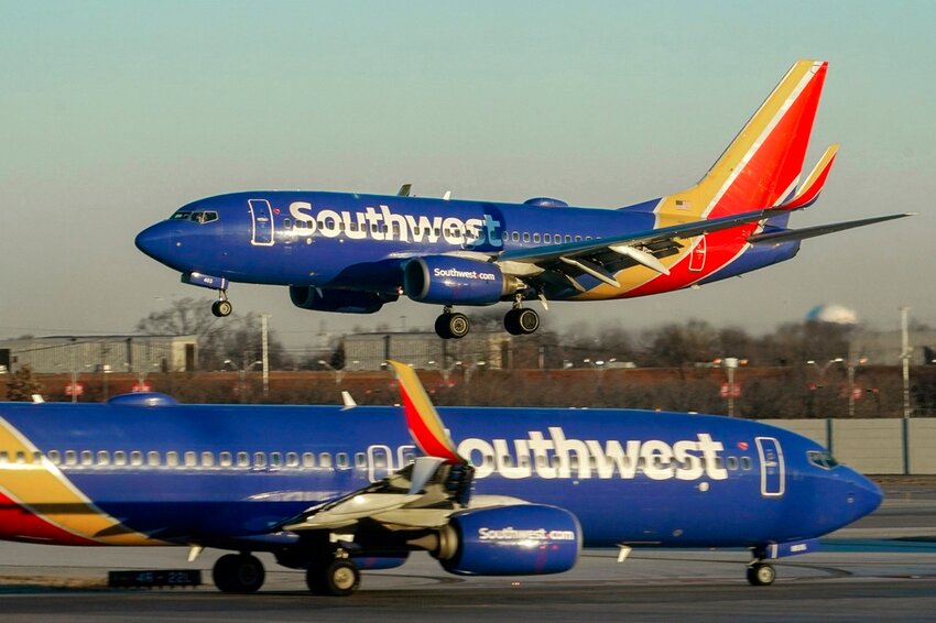 A Southwest Airlines plane lands at Midway International Airport, Feb. 12, 2023, in Chicago. (AP Photo/Kiichiro Sato, File)