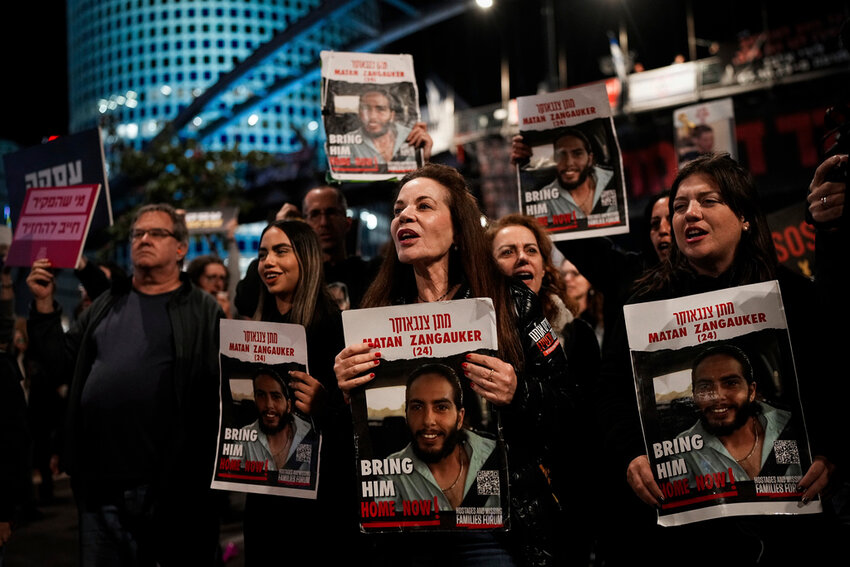 Relatives and supporters of the Israeli hostages held in the Gaza Strip by the Hamas militant group attend a rally calling for their release, in Tel Aviv, Israel, on March 16, 2024. (AP Photo/Ohad Zwigenberg, File)