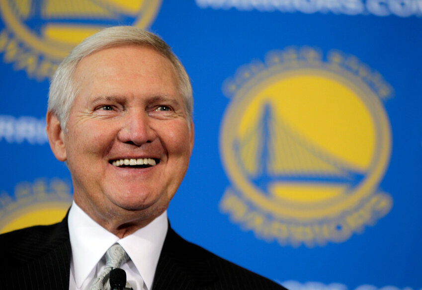 Jerry West smiles after being introduced as a new member of the Golden State Warriors basketball club's Executive Board, during a news conference in San Francisco, May 24, 2011. (AP Photo/Eric Risberg, File)