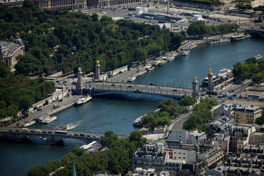 FILE - The Alexander III bridge, center, is visible July 11, 2023, in Paris. In 2024. Water in the Seine River had unsafe elevated levels of E. coli less than two months before swimming competitions are scheduled to take place in it during the Paris Olympics, according to test results published Friday, June 14, 2024. (AP Photo/Thomas Padilla, File)