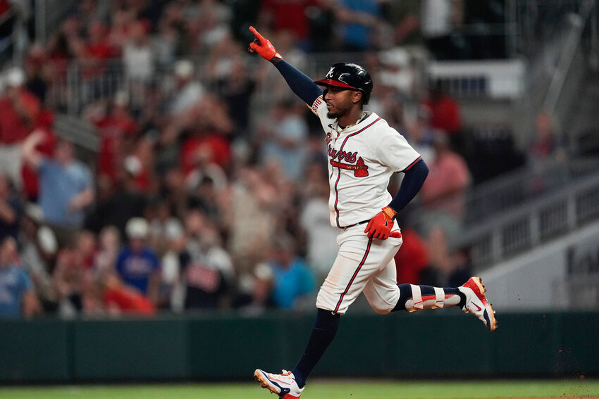 Atlanta Braves' Ozzie Albies runs the bases after putting the Braves ahead with a solo home run in the eighth inning against the Detroit Tigers on Monday, June 17, 2024, in Atlanta. (AP Photo/John Bazemore)