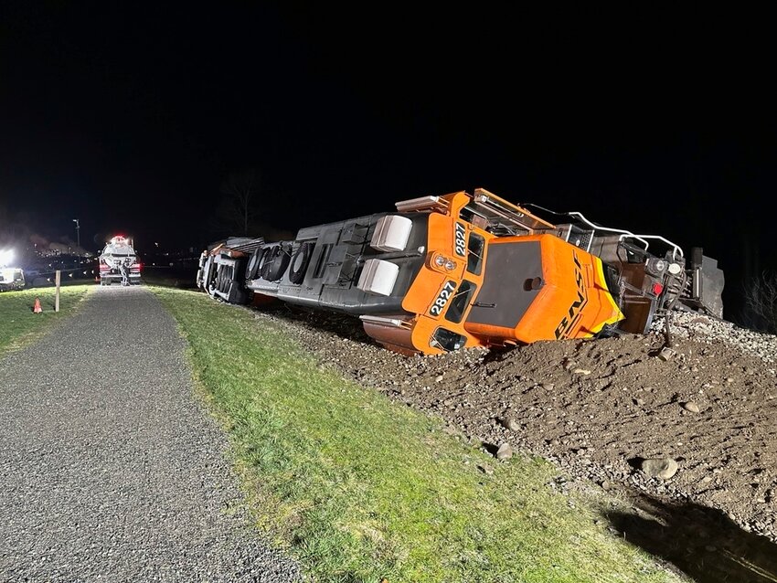 A derailed BNSF train on the Swinomish tribal reservation near Anacortes, Wash. on March 16, 2023. (Washington Department of Ecology via AP)
