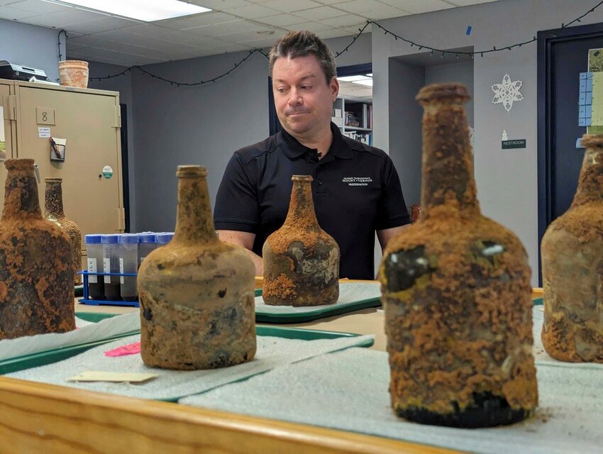 Archeologist Jason Boroughs discusses artifacts found underneath George Washington's residence in Mount Vernon, Va., Monday, June 17, 2024. (AP Photo/Nathan Ellgren)