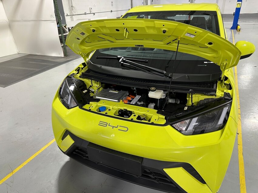 A BYD Seagull electric vehicle, with its hood open, is shown at the Caresoft Global facility April 3, 2024, in Livonia, Mich. (AP Photo/Mike Householder, File)