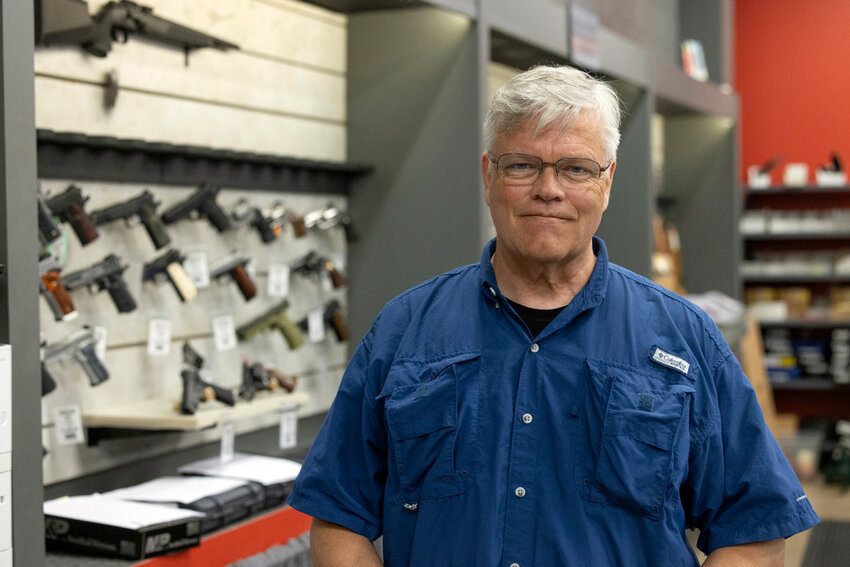 Maxon Shooter's Supplies owner Dan Eldridge poses in his store in Des Plaines, Ill., Tuesday, June 25, 2024. (AP Photo/Teresa Crawford)