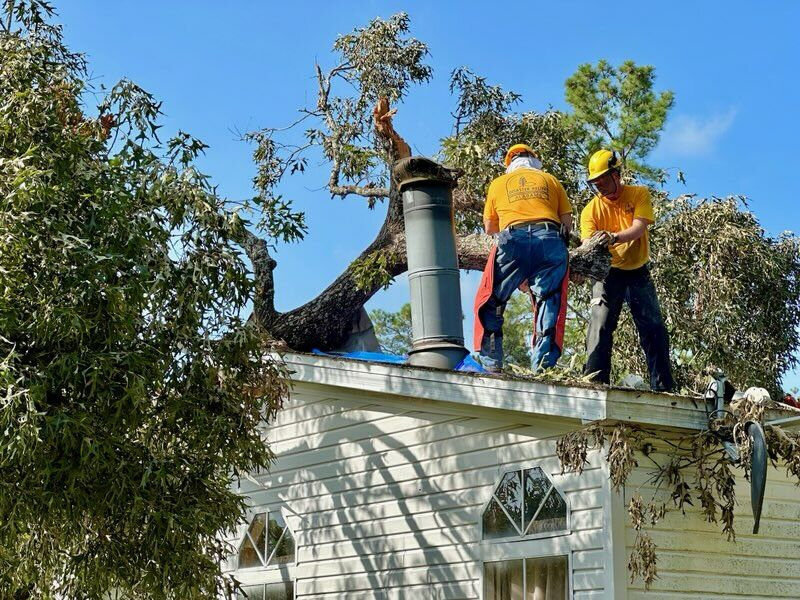 Alabama Baptist Disaster Relief volunteers work to remove a tree from a house in Huffman, Texas. (Photo/ABDR via The Alabama Baptist)