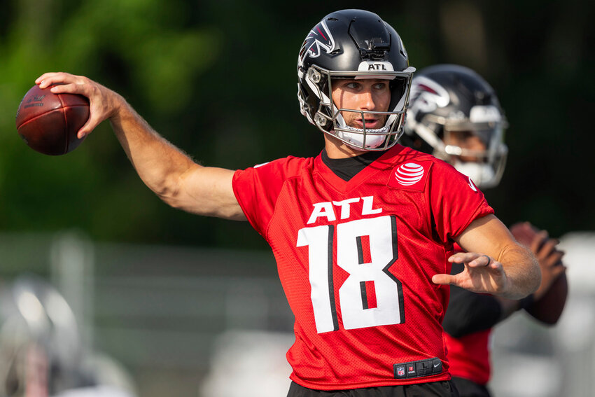 Atlanta Falcons quarterback Kirk Cousins (18) throws a pass during practice, Saturday, July 27, 2024, in Buford, Ga. (AP Photo/Jason Allen)