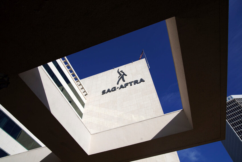 SAG-AFTRA signage is seen on the side of the headquarters in Los Angeles on Nov. 10, 2023. (AP Photo/Richard Vogel, File)