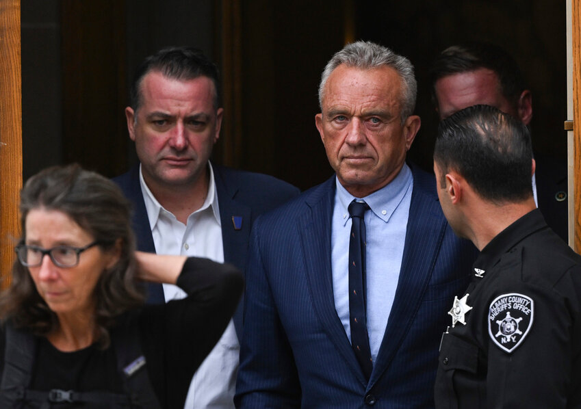 Independent presidential candidate Robert F. Kennedy Jr., center right, leaves the Albany County Courthouse, Aug. 6, 2024, in Albany, N.Y. (AP Photo/Hans Pennink, File)