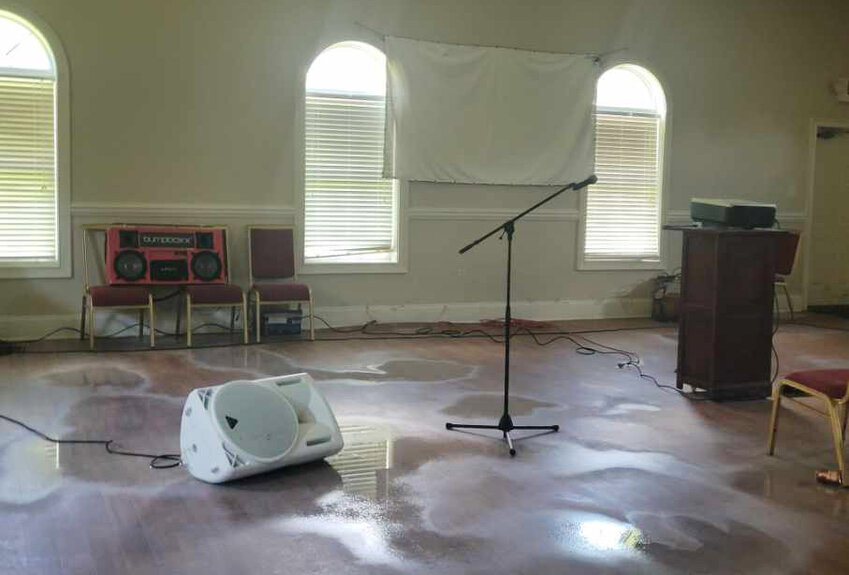 The worship space in Cambodian Baptists' Blessing Field retreat center was just one of the buildings overrun with water in flooding from Tropical Storm Debby. (Photo/via Baptist Press)