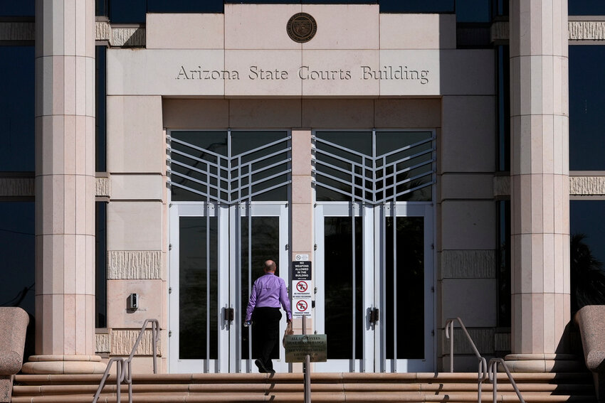 A man enters the Arizona Supreme Court building on April 10, 2024, in Phoenix. (AP Photo/Matt York, File)