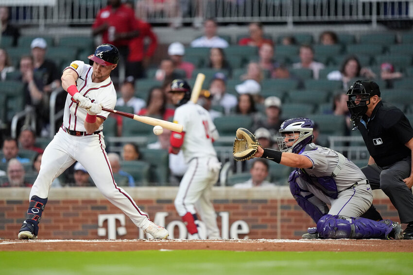 Atlanta Braves' Jarred Kelenic (24) hits the ball in the first inning against the Colorado Rockies, Wednesday, Sept. 4, 2024, in Atlanta. (AP Photo/Brynn Anderson)