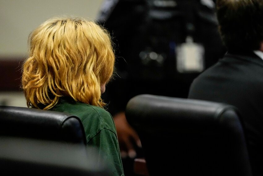 Colt Gray, charged as an adult with four counts of murder, sits in the Barrow County courthouse during his first appearance for the Wednesday shooting at Apalachee High School, Friday, Sept. 6, 2024, in Winder, Ga.  (AP Photo/Brynn Anderson, Pool)