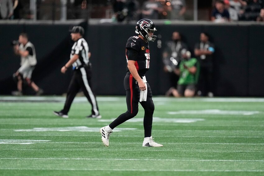 Atlanta Falcons quarterback Kirk Cousins walks off the field after an interception during the second half against the Pittsburgh Steelers on Sunday, Sept. 8, 2024, in Atlanta. (AP Photo/John Bazemore)