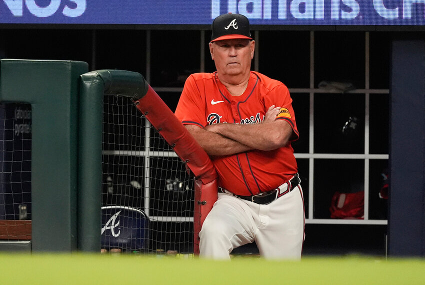 Atlanta Braves manager Brian Snitker looks on from the dugout during a game against the Toronto Blue Jays, Friday, Sept. 6, 2024, in Atlanta. (AP Photo/John Bazemore)