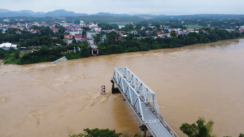 A bridge collapse due to floods triggered by typhoon Yagi in Phu Tho province, Vietnam on Monday, Sept. 9, 2024 (Bui Van Lanh/ VNA via AP)