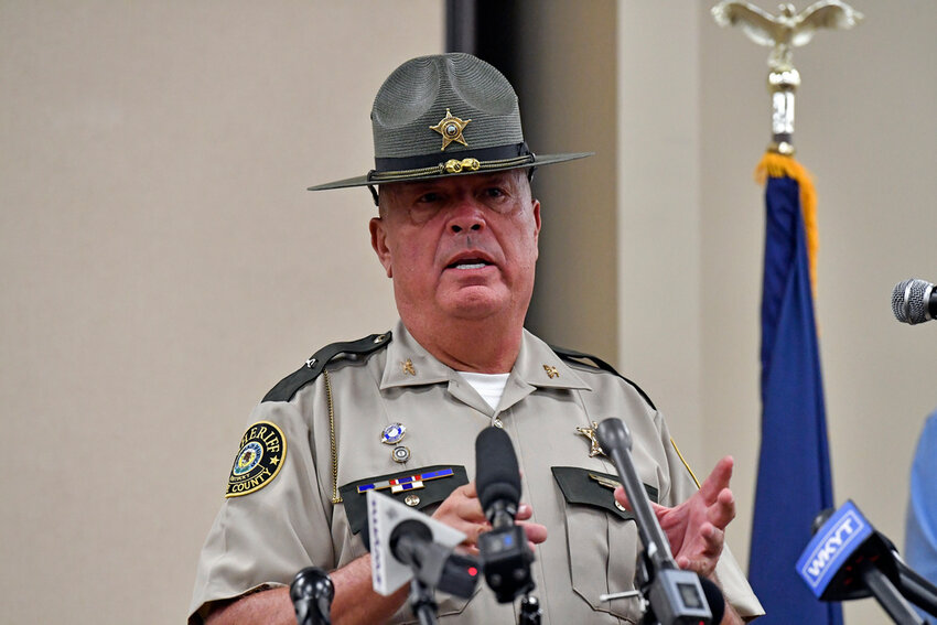 Laurel County sheriff John Root gives an update at the London Community Center in London, Ky., Sunday, Sept. 8, 2024, on the efforts to find the suspect in the Saturday shooting at Interstate 75 near Livingston, Ky. (AP Photo/Timothy D. Easley)