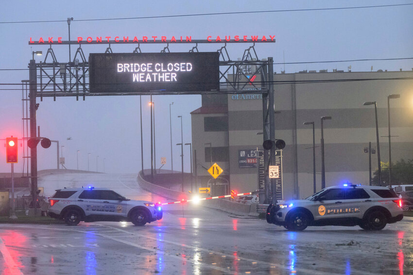 The entrance to Lake Ponchartrain Causeway is closed due to Hurricane Francine in Metairie, La., Wednesday, Sept. 11, 2024. (AP Photo/Matthew Hinton)