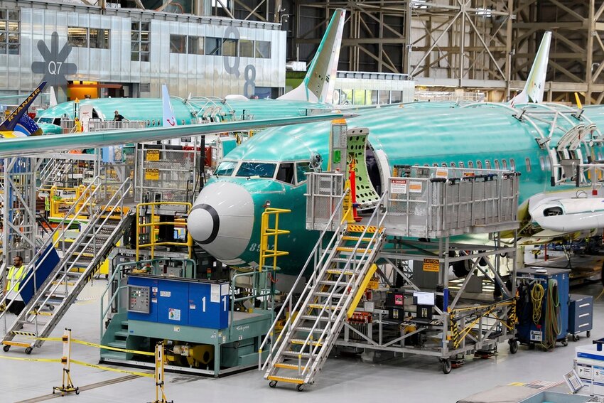 Boeing 737 MAX airplanes are shown on the assembly line during a media tour at the Boeing facility in Renton, Wash., June 25, 2024. (Jennifer Buchanan/The Seattle Times via AP, Pool, File)