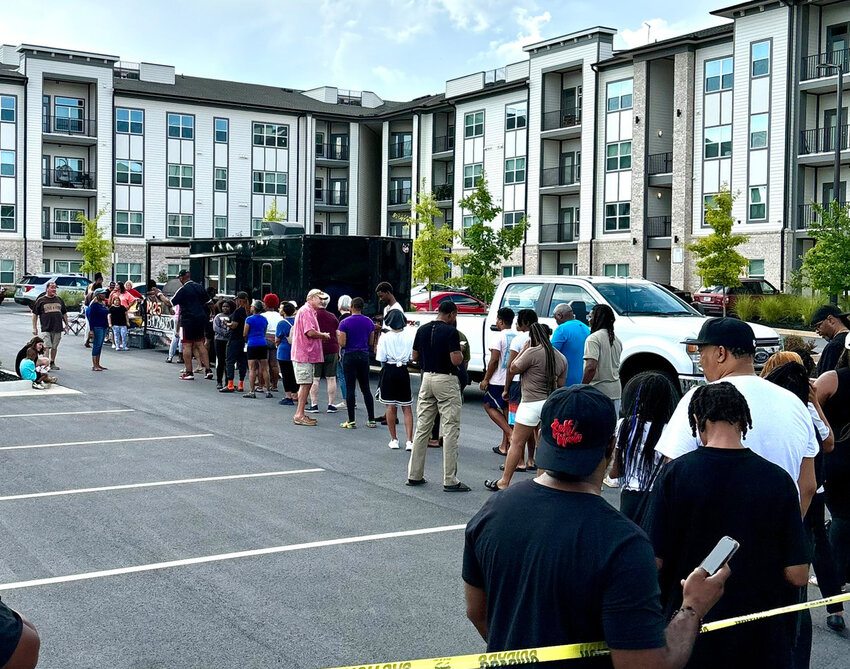 Long lines are commonplace when M25 Barbecue shows up with free food. (Photo/courtesy Eli Akin)