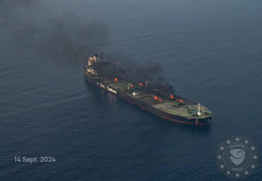 This photo released by the European Union's Operation Aspides naval force shows the oil tanker Sounion burning in the Red Sea following a series of attacks by Yemen's Houthi rebels, on Saturday Sept. 14, 2024. (European Union's Operation Aspides via AP)