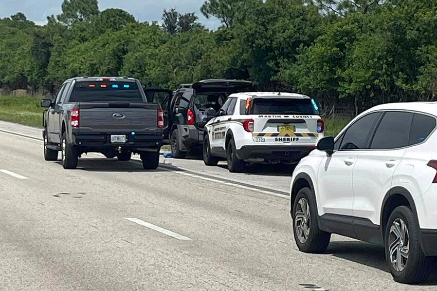 Sheriff's vehicles surround an SUV on northbound I-95 in Martin County on Sunday, Sept. 15, 2024. (Martin County Sheriff's Office via AP)