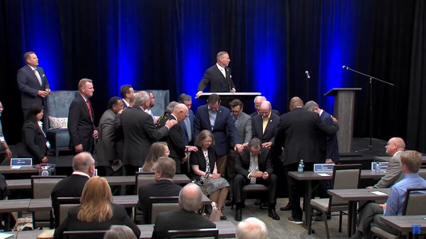 SBC Executive Committee members pray over new EC president and CEO Jeff Iorg and his wife, Ann, Iorg during their installation service Monday, Sept. 16.
(Photo/SBC video via The Baptist Paper)