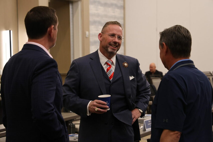 Clint Pressley chats with IMB President Paul Chitwood, left, and NAMB President Kevin Ezell during a break between sessions of the SBC’s Executive Committee meeting in Nashville, Tuesday, Sept. 17. (The Baptist Paper/Van Payne)