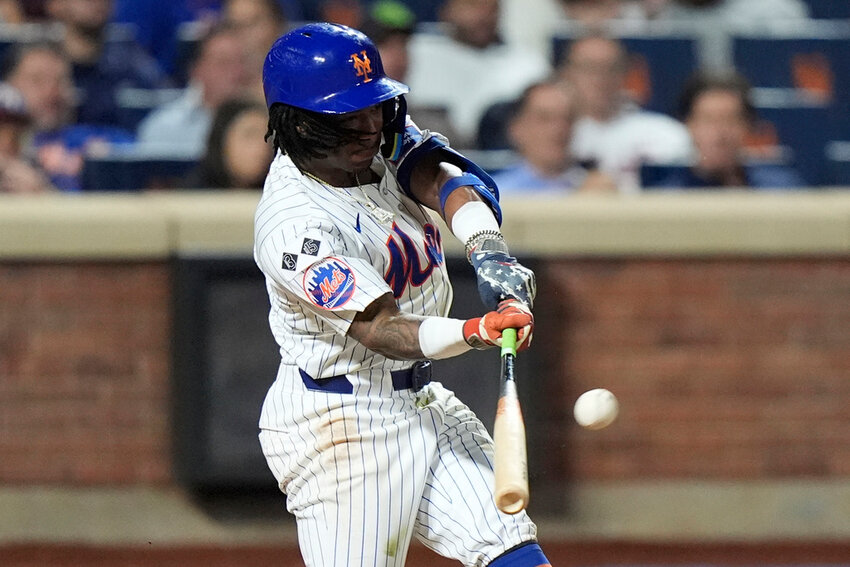 New York Mets' Luisangel Acuna hits a home run during the eighth inning against the Washington Nationals, Tuesday, Sept. 17, 2024, in New York. (AP Photo/Frank Franklin II)