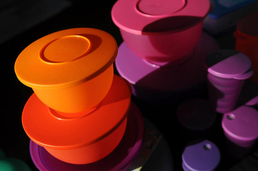 Colorful Tupperware products are seen in Bellflower, Calif. on Aug. 5, 2011. (AP Photo/Garrett Cheen, File)