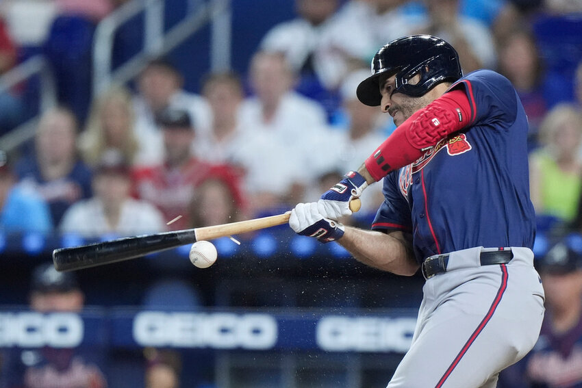 Atlanta Braves' Ramón Laureano splinters his bat during the first inning of a baseball game against the Miami Marlins, Sunday, Sept. 22, 2024, in Miami. (AP Photo/Wilfredo Lee)