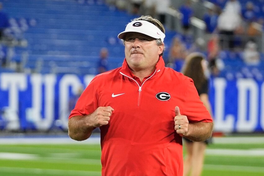 Georgia head coach Kirby Smart runs off the field following a game against Kentucky, Saturday, Sept. 14, 2024, in Lexington, Ky. (AP Photo/Darron Cummings)