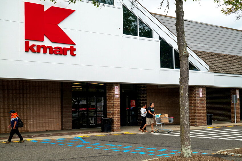 Shoppers leave the K-Mart store in Bridgehampton, N.Y., on Monday, Sept. 23, 2024. (Tom Lambui/Newsday via AP)