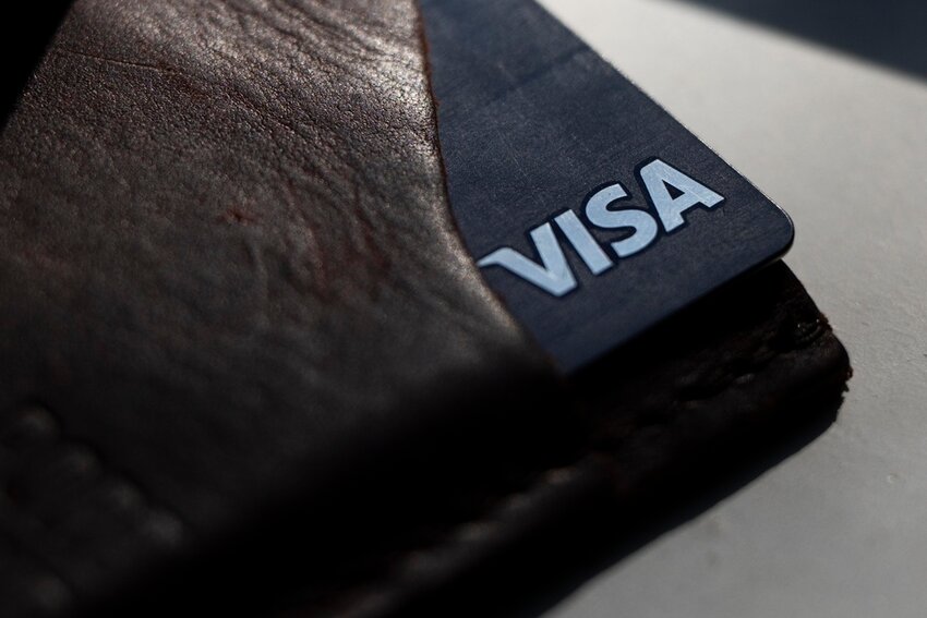 A Visa card is displayed on May 15, 2024, in Portland, Ore. (AP Photo/Jenny Kane, File)