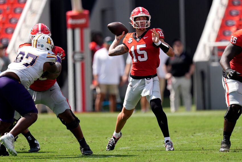 Georgia quarterback Carson Beck throws a pass during the first half against Tennessee Tech on Saturday, Sept. 7, 2024, in Athens, Ga. (AP Photo/John Bazemore, File)