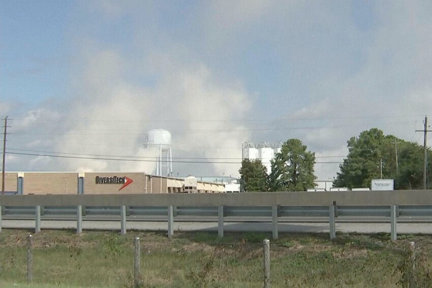 In this image taken from video from WSB-TV, smoke rises from the roof of a BioLab plant, Sunday, Sept. 29, 2024, in Conyers, Ga. (WSB-TV via AP)