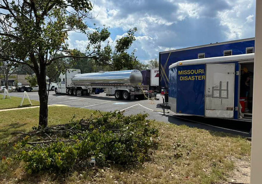 Downed limbs are seen beside a Missouri Baptist Disaster Relief mobile kitchen set up at Fleming Baptist Church in Augusta, Ga. (Photo/Georgia Baptist Mission Board)