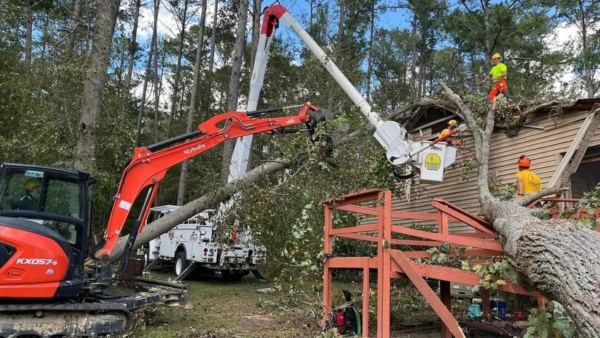 Alabama Baptist Disaster Relief teams cut and remove fallen trees in the Clearwater, South Carolina, area this week in the wake of Hurricane Helene. (Photo/Alabama Baptist)