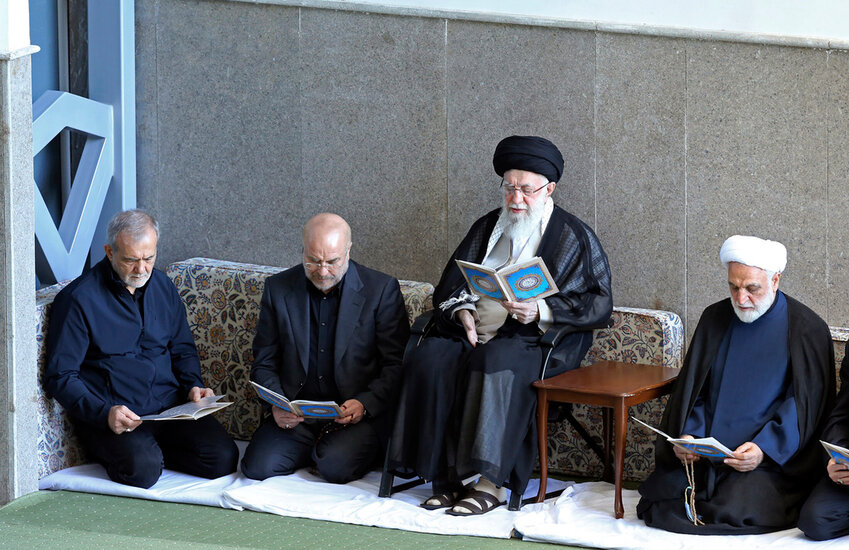 Supreme Leader Ayatollah Ali Khamenei, second right, Judiciary Chief Gholam Hossein Mohseni Ejehei, right, Parliament Speaker Mohammad Bagher Qalibaf, second left, and President Masoud Pezeshkian read Quran in a ceremony commemorating slain Hezbollah leader Hassan Nasrallah, at Imam Khomeini grand mosque in Tehran, Iran, Friday, Oct. 4, 2024. (Office of the Iranian Supreme Leader via AP)