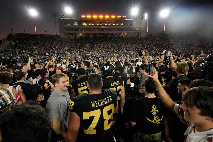 Vanderbilt celebrates the team's 40-35 win against Alabama, Saturday, Oct. 5, 2024, in Nashville, Tenn. (AP Photo/George Walker IV)