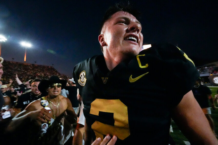 Vanderbilt quarterback Diego Pavia (2) celebrates the team's 40-35 win against Alabama, Saturday, Oct. 5, 2024, in Nashville, Tenn. (AP Photo/George Walker IV)