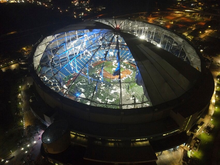 An aerial view of Tropicana Field's shredded roof in downtown St. Petersburg, Fla., in the wake of Hurricane Milton early Thursday, Oct. 10, 2024.  (Max Chesnes/Tampa Bay Times via AP)