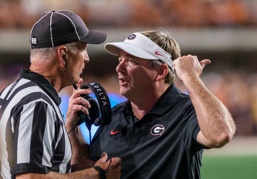 Georgia head coach Kirby Smart argues with an official during a timeout against Texas in the first half in Austin, Texas, Saturday, Oct. 19, 2024. (AP Photo/Rodolfo Gonzalez)