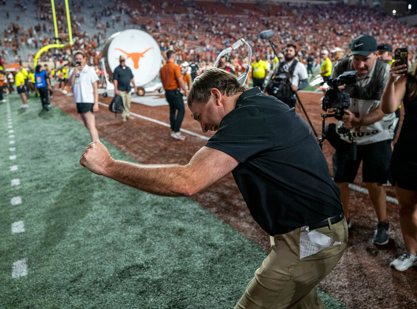 Georgia head coach Kirby Smart celebrates with Georgia fans cheering from the stands after defeating Texas in Austin, Texas, Saturday, Oct. 19, 2024. (AP Photo/Rodolfo Gonzalez)