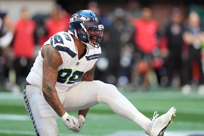 Seattle Seahawks defensive end Leonard Williams reacts after sacking Atlanta Falcons quarterback Kirk Cousins during the first half Sunday, Oct. 20, 2024, in Atlanta. (AP Photo/ Brynn Anderson )