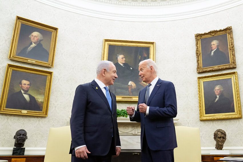 President Joe Biden, right, talks with Israeli Prime Minister Benjamin Netanyahu, left, in the Oval Office of the White House in Washington, July 25, 2024. (AP Photo/Susan Walsh, File)