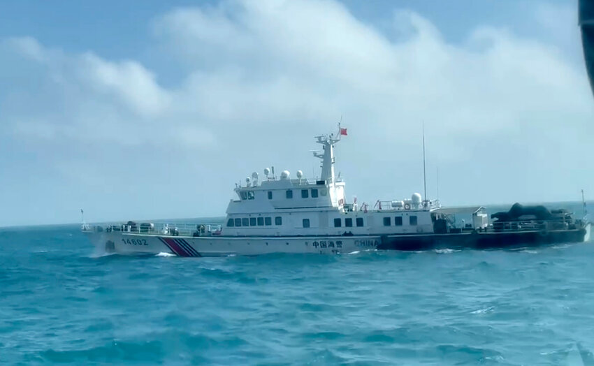 A China Coast Guard boat is seen from a Taiwan Coast Guard boat as it passes near the coast of the Matsu islands, Taiwan, Monday, Oct. 14, 2024. (Taiwan Coast Guard via AP)